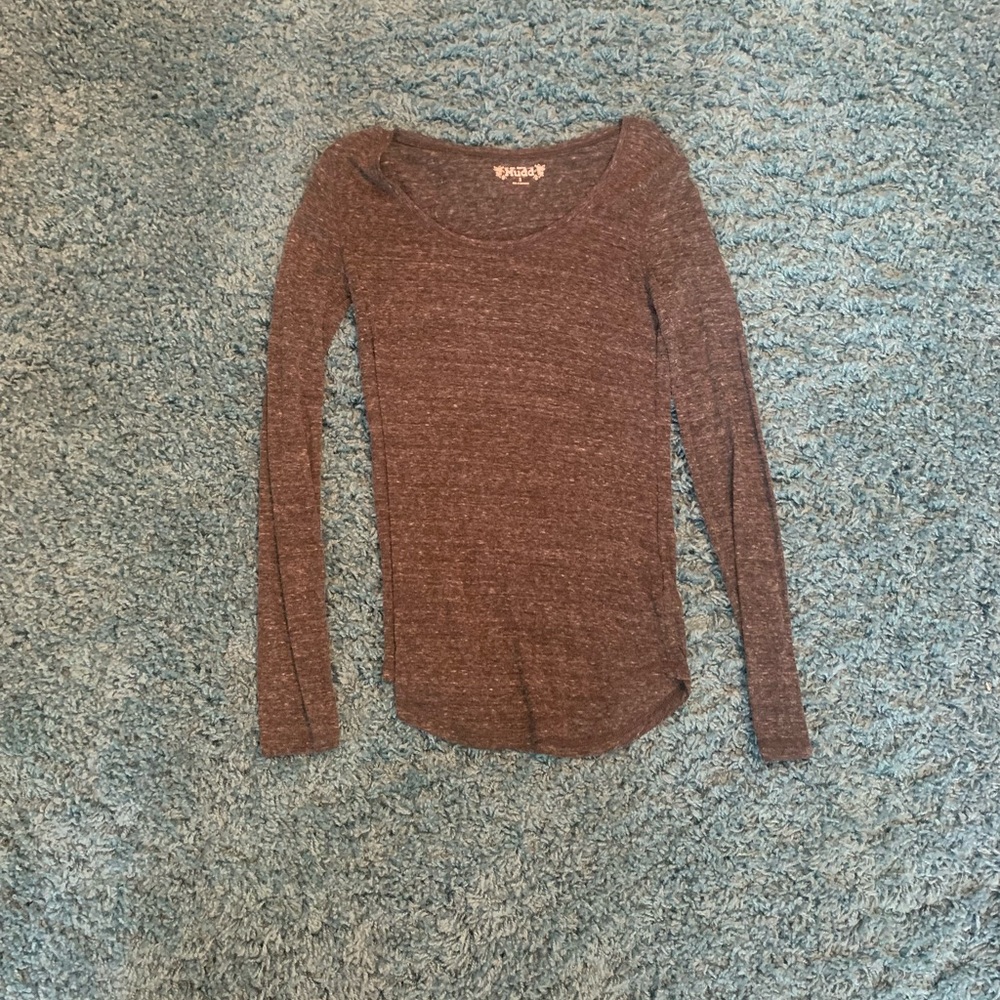 Heathered gray long sleeve, thinner. Perfect for under vest
